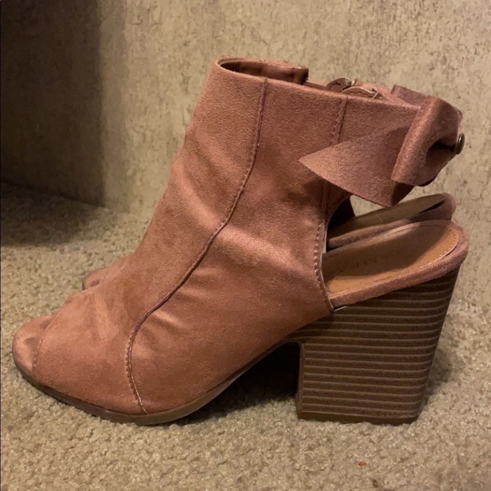 Pink open toe and heel, heels.